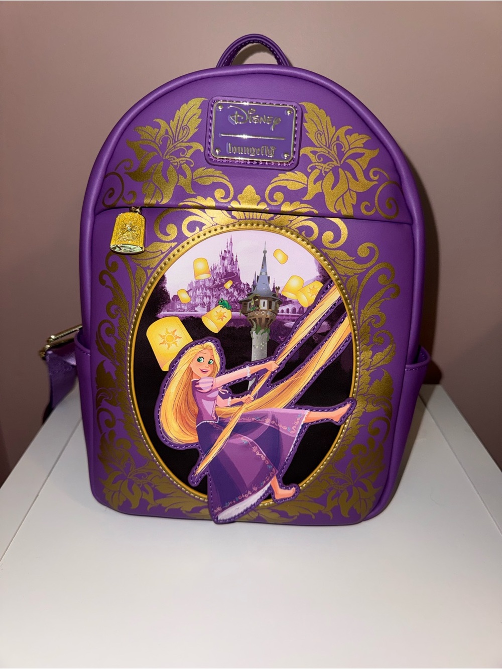 Loungefly Purple and Gold Rapunzel Mini Backpack